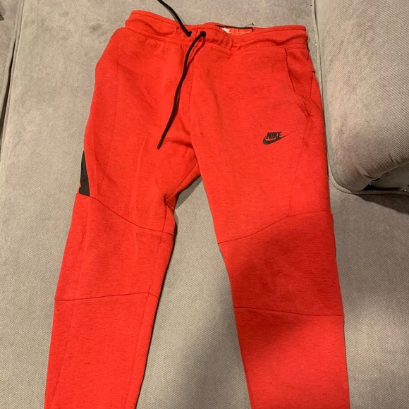 red nike tech pants